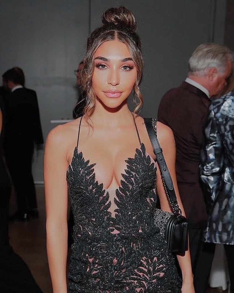 Chantel Jeffries flaunts her cleavage in glittering sheer black gown while walking the red carpet at amfAR gala