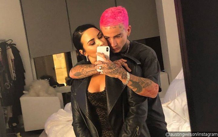 The ‘Heart Attack’ Singer And Her Heavily-Tattooed Beau Take To Their Respective Social Media Account To Share A Picture Of Them Kissing And Embracing Each Other.