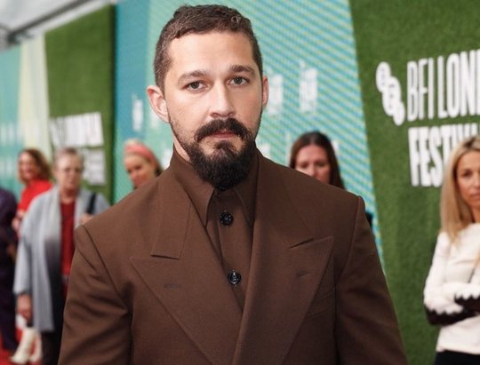 Shia LaBeouf cuts a dapper look at Hollywood Film Awards as he thanks the officer who arrested him for public drunkenness in acceptance speech