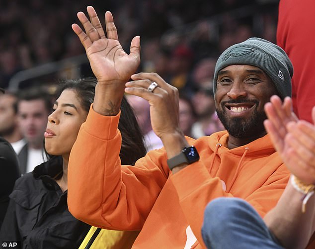 Kobe Bryant and daughter Gianna sit courtside to watch Los Angeles Lakers game at Staples Center