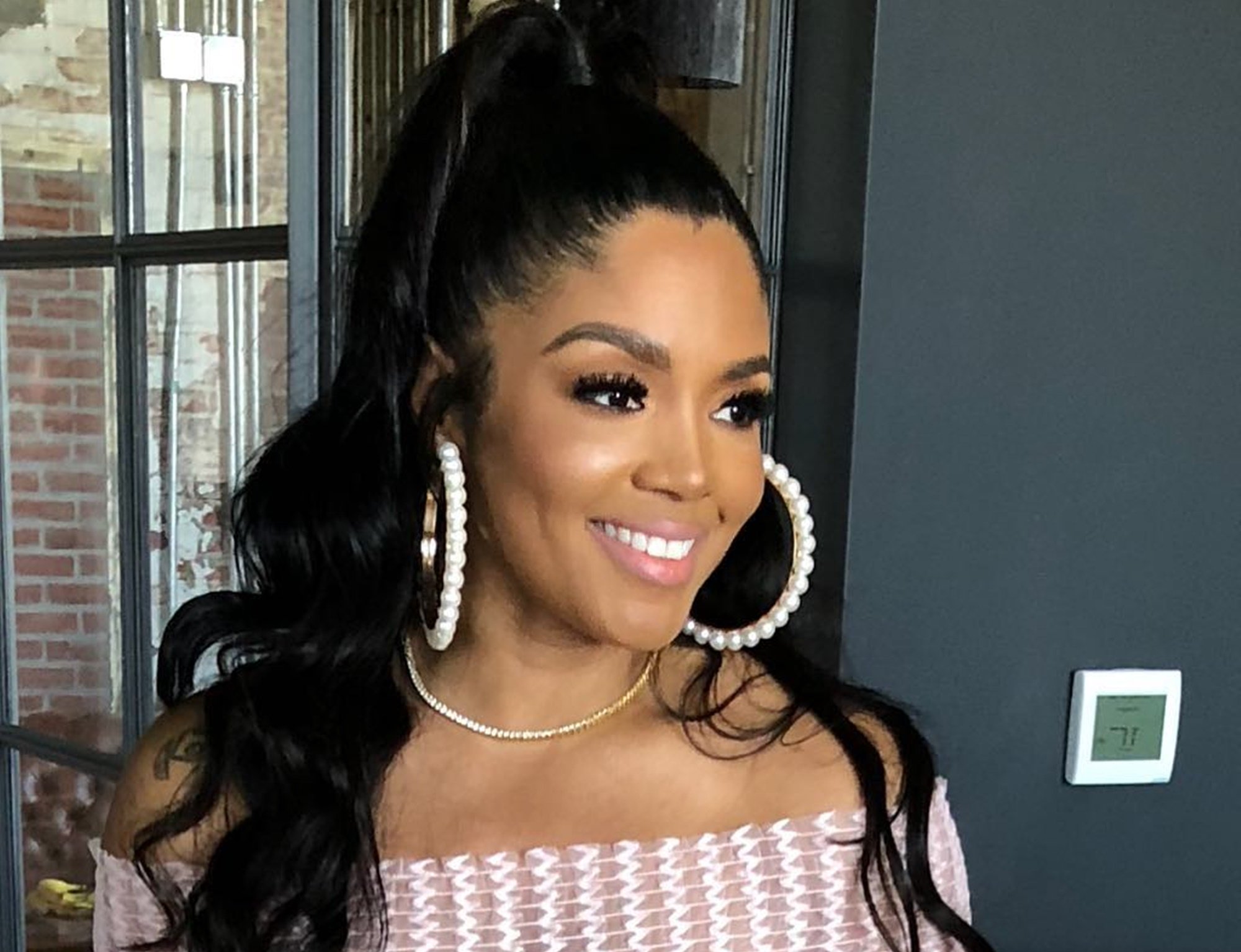 Rasheeda Frost flaunted a fly look for her last-minute Christmas shopping