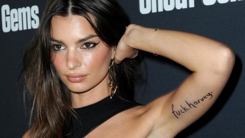 Emily Ratajkowski responds to Weinstein’s $25M civil settlement as she arrives to Uncut Gems premiere with ‘f**k Harvey’ written on her arm