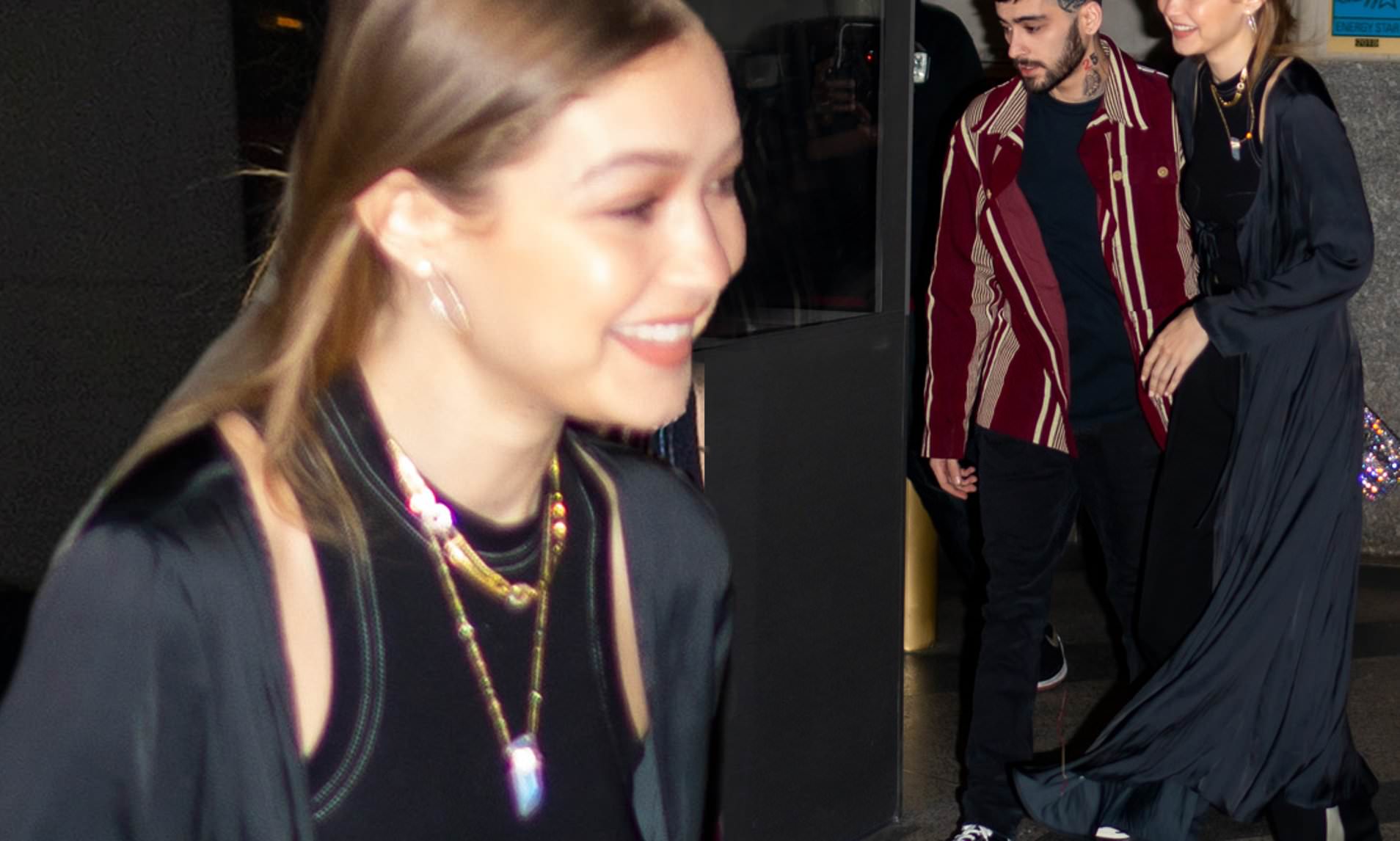 Gigi Hadid couldn’t look happier as she walks arm in arm with Zayn Malik after reuniting with on/off boyfriend on his birthday