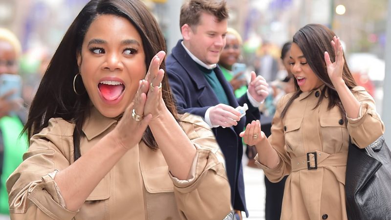 Regina Hall douses her hands in hand sanitizer after taking selfies with fans in New York amid coronavirus fears