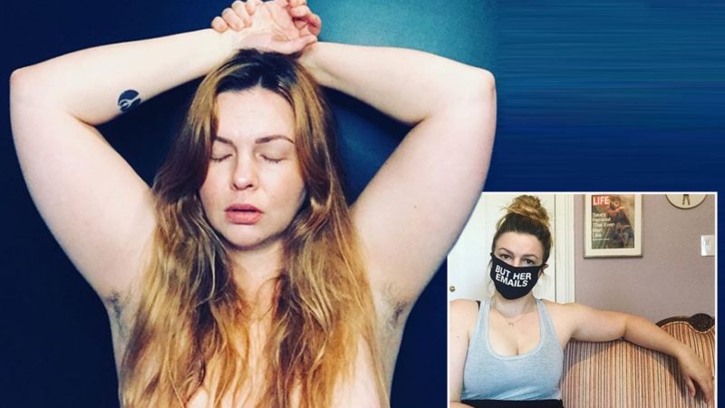 ‘No disguise, no veil for the body’: Actress Amber Tamblyn shows off her armpit hair and her dark roots while posing in a topless photo to mark her 37th birthday