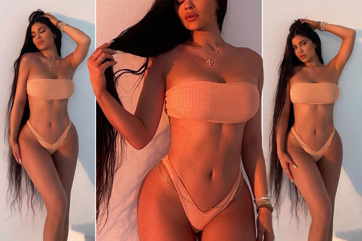Kylie Jenner flaunts curves in tiny bikini and shows off new long hair that reaches down to her knees