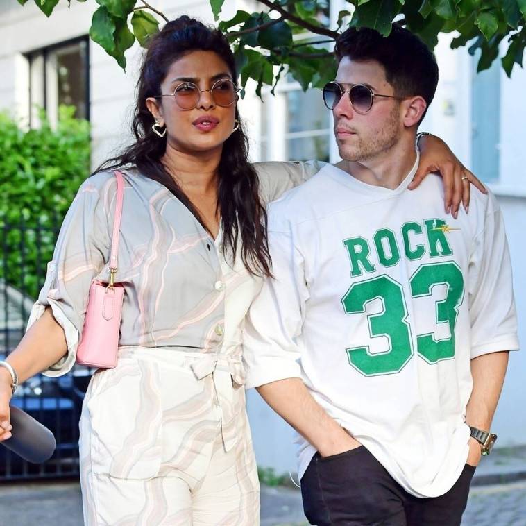 Nick Jonas Takes a Bite Out of Priyanka Chopra’s Booty in Cheeky Photo