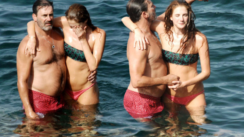 Jon Hamm and girlfriend Anna Osceola show PDA while swimming in Italy